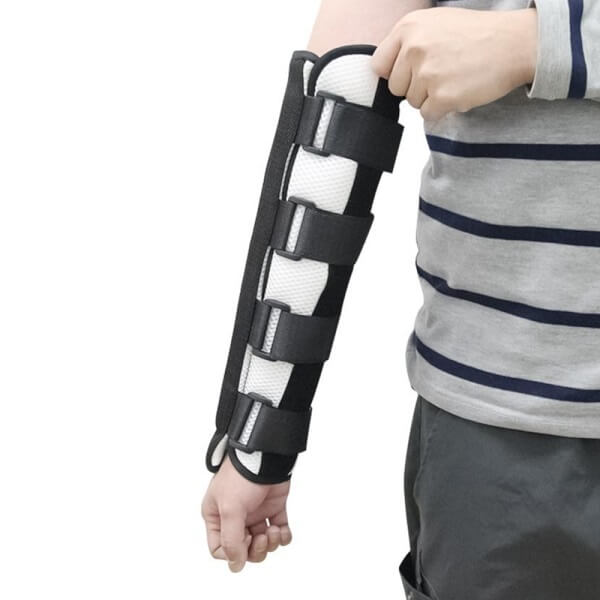 Image of man wearing the orthosis rehabilitative arm brace with internal metal supports.