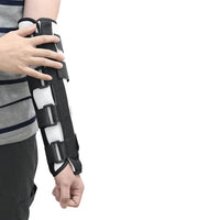Thumbnail for Image of man wearing the orthosis rehabilitative arm brace with internal metal supports.