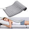 Electric heating pad being used to relief back pain along the upper, mid and lower back