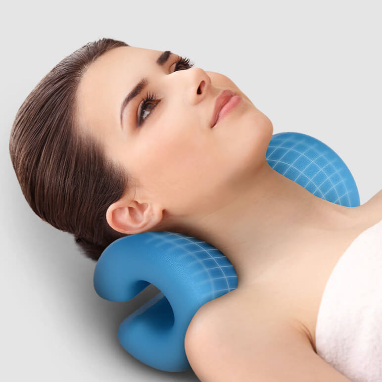 Image of a woman resting on the NeckAnvil cervical traction pillow.