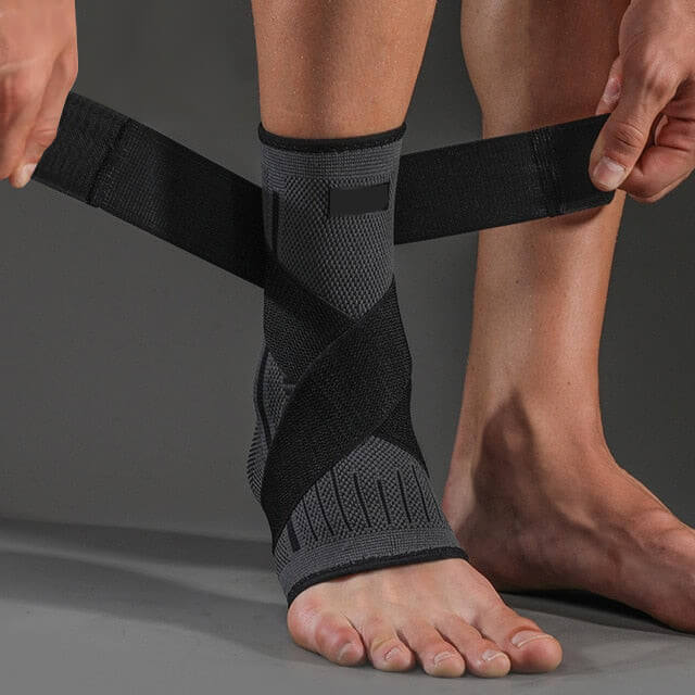 Image of OrthoRelieve's ankle compression sleeve with support straps in black color.
