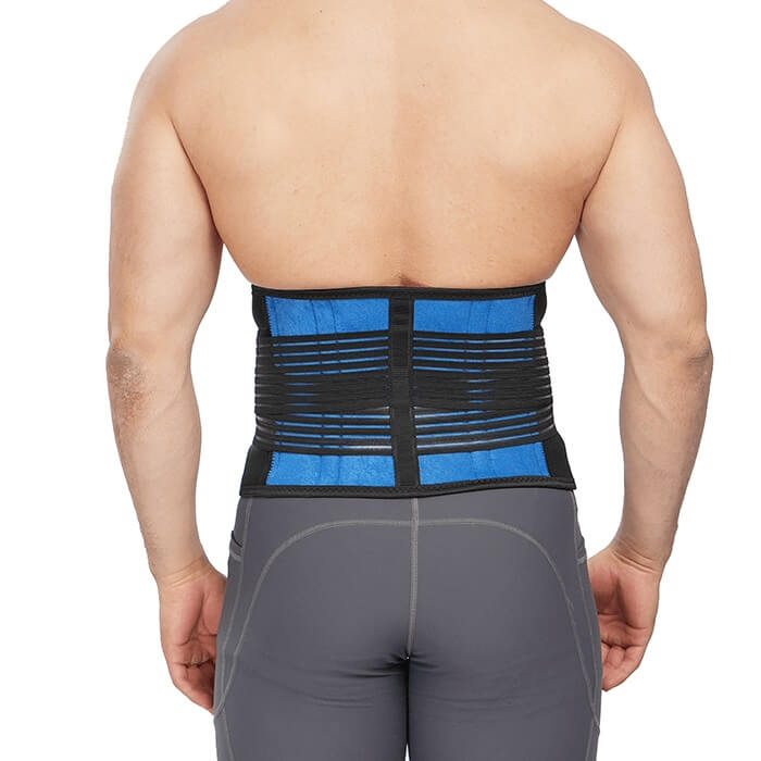 Back view of a man wearing the LumbarExtreme back brace that has sizes up to 6XL.