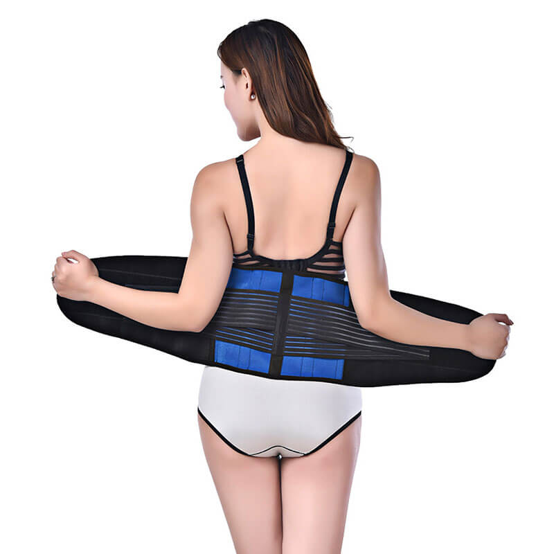 Back view of a woman wearing the LumbarExtreme back brace from the rear view.