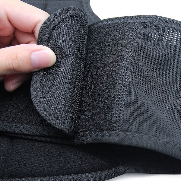 Closeup image of the Velcro tabs of the posture corrector.