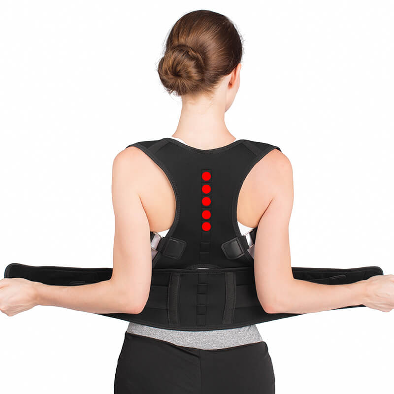 Image of a woman wearing the posture corrector with therapeutic magnets.