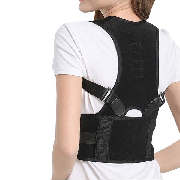 Woman wearing the posture corrector with healing magnetic therapy.